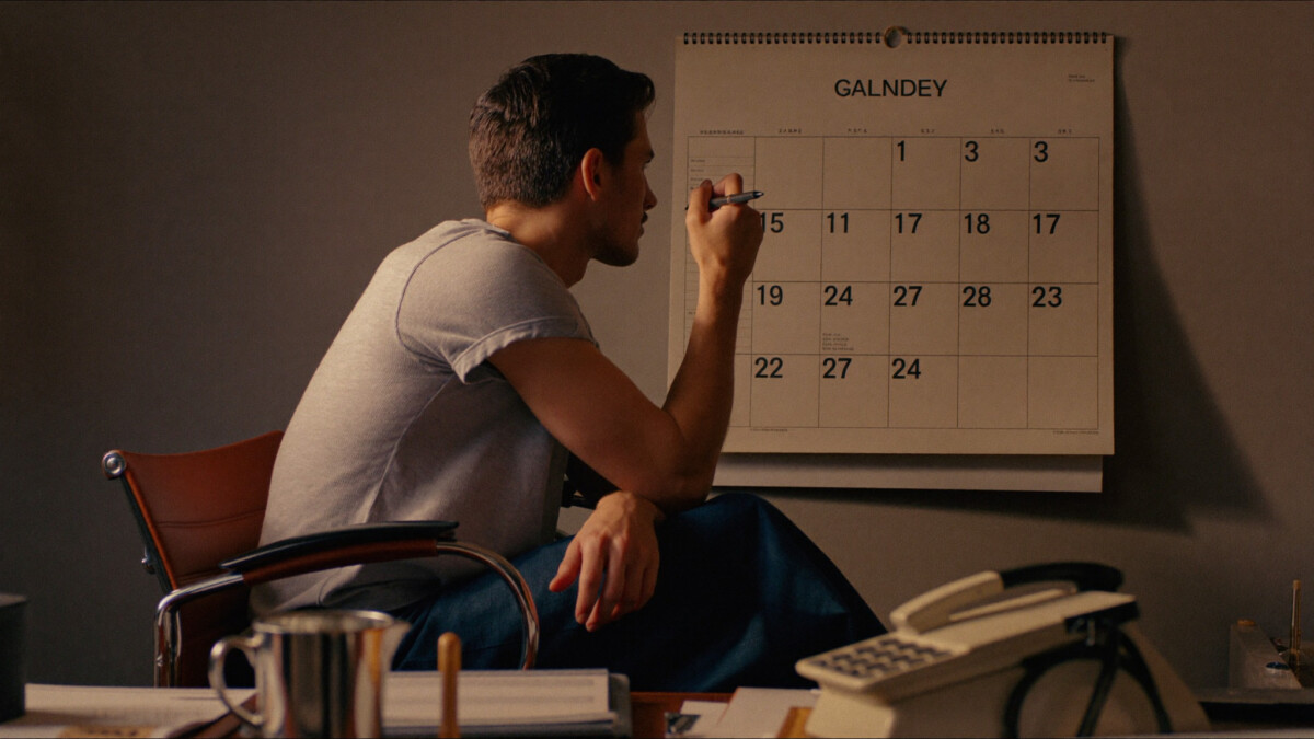 man pausing before a purchase decision with calendar and thoughtful expression